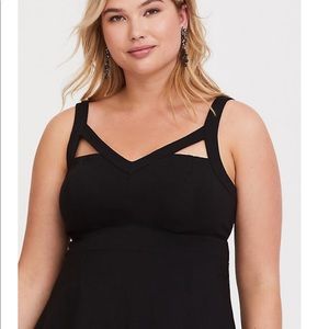 Torrid peplum with cutouts